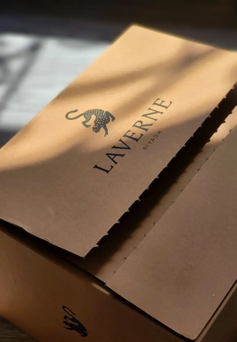 Basalt & Bone Studio packaging system — leopard-print box detail from the finished brand identity
